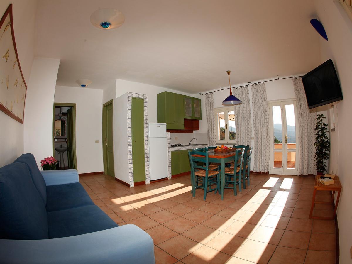 Residence Le Solane Marina di Campo Rom bilde