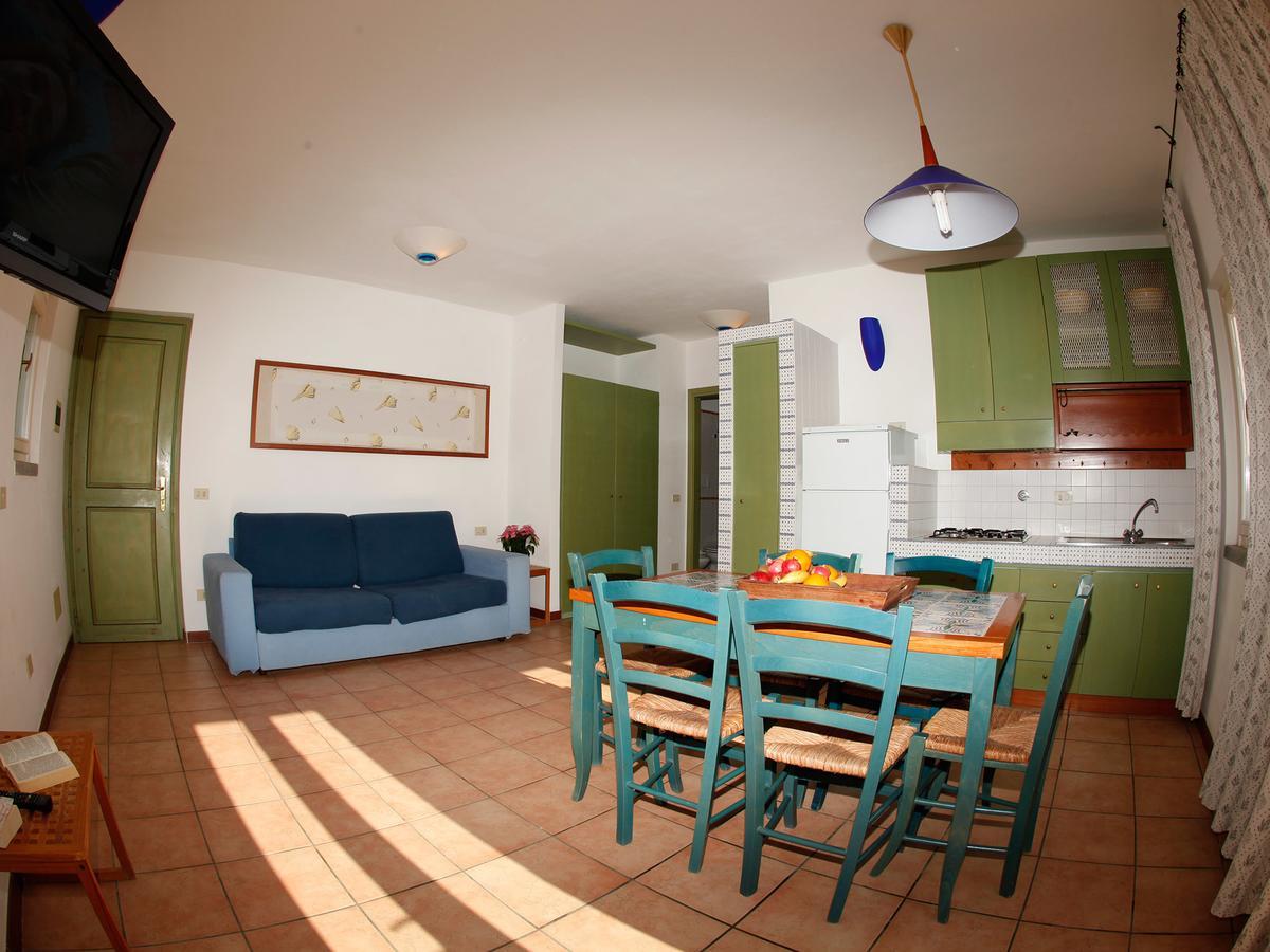 Residence Le Solane Marina di Campo Rom bilde