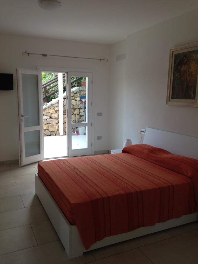 Residence Le Solane Marina di Campo Rom bilde